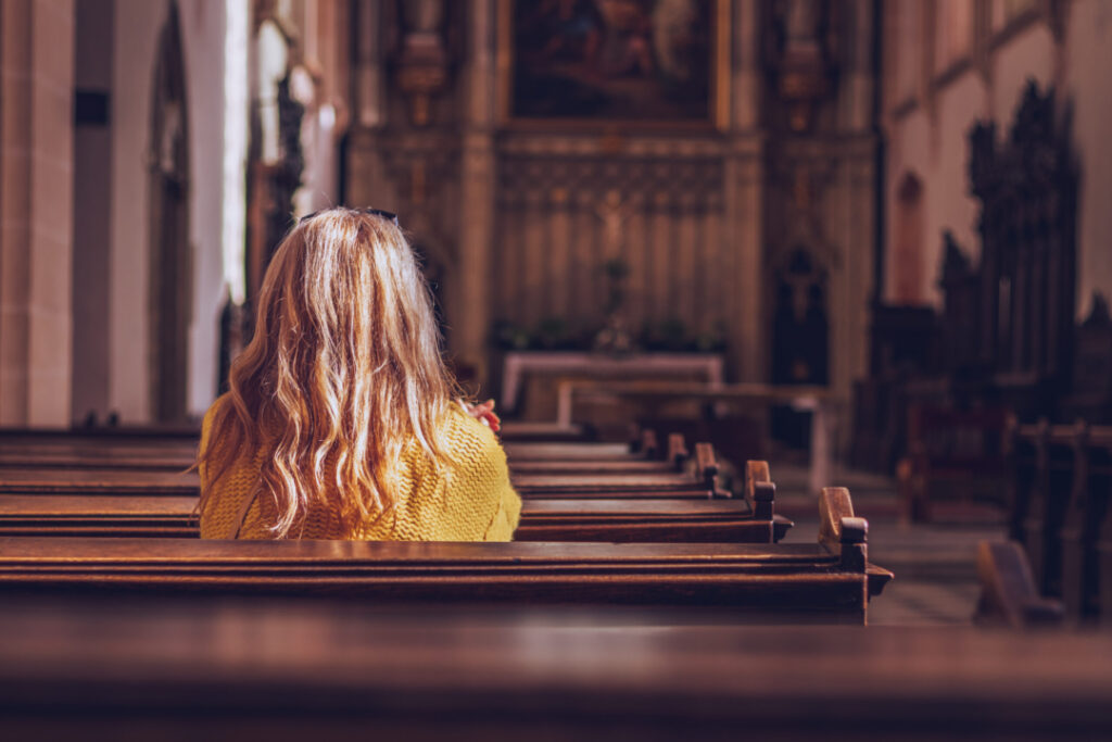 Woman sitting in church